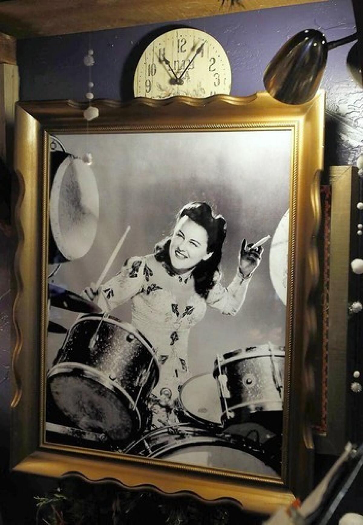 A studio publicity photo of Viola Smith playing the drums adorns the wall of the Piecemakers Country Store in Costa Mesa.