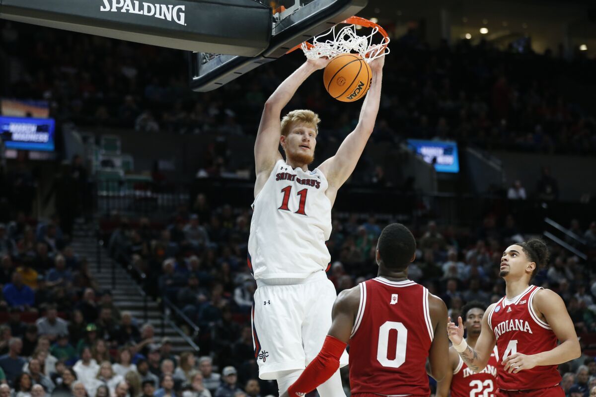 St. Mary's big man Matthias Tass dunks during the Gaels' 82-53 win over Indiana on Thursday in the NCAA tournament.