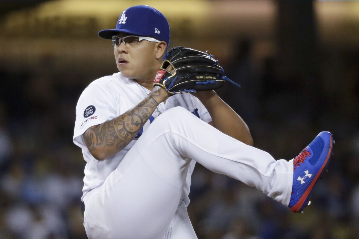 Dodgers pitcher Julio Urias delivers during the second inning of Tuesday's victory.