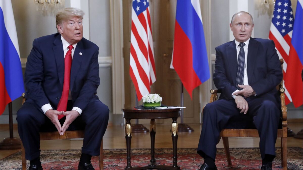 U.S. President Donald Trump, left, and Russian President Vladimir Putin, right, in Helsinki, Finland, on July 16.