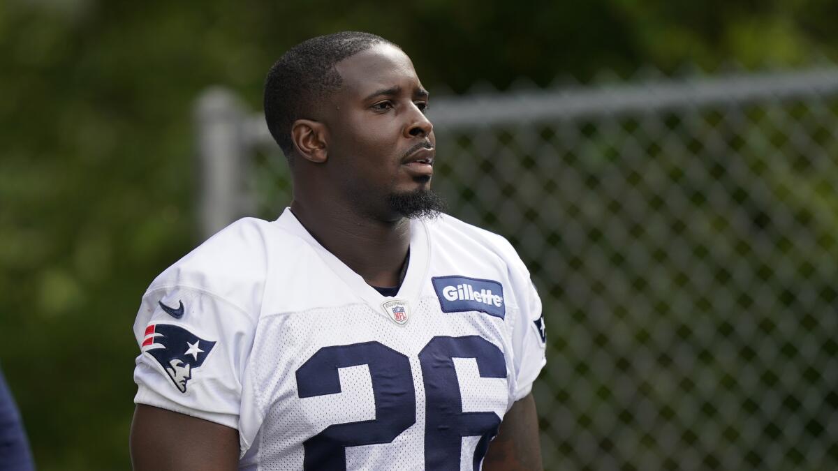 New England Patriots running back Sony Michel arrives at an NFL football practice.