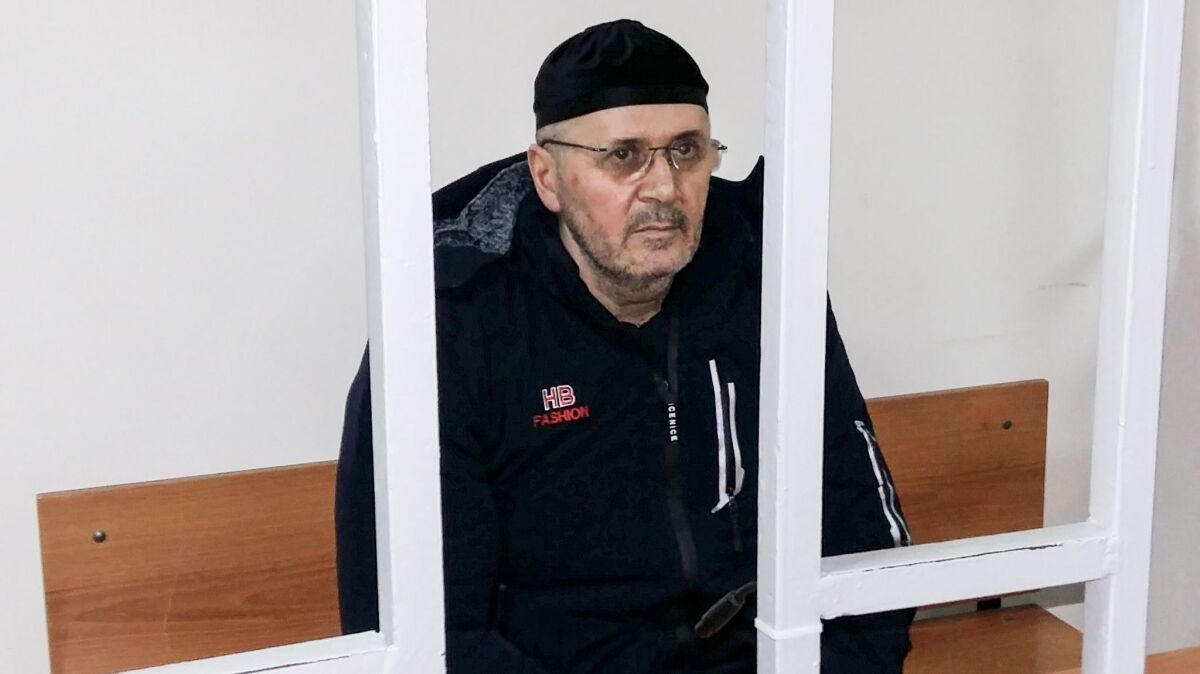 Oyub Titiyev, who heads the Russian human rights group Memorial's office in Grozny, attends a court hearing in the Chechen capital on Jan. 25, 2018.