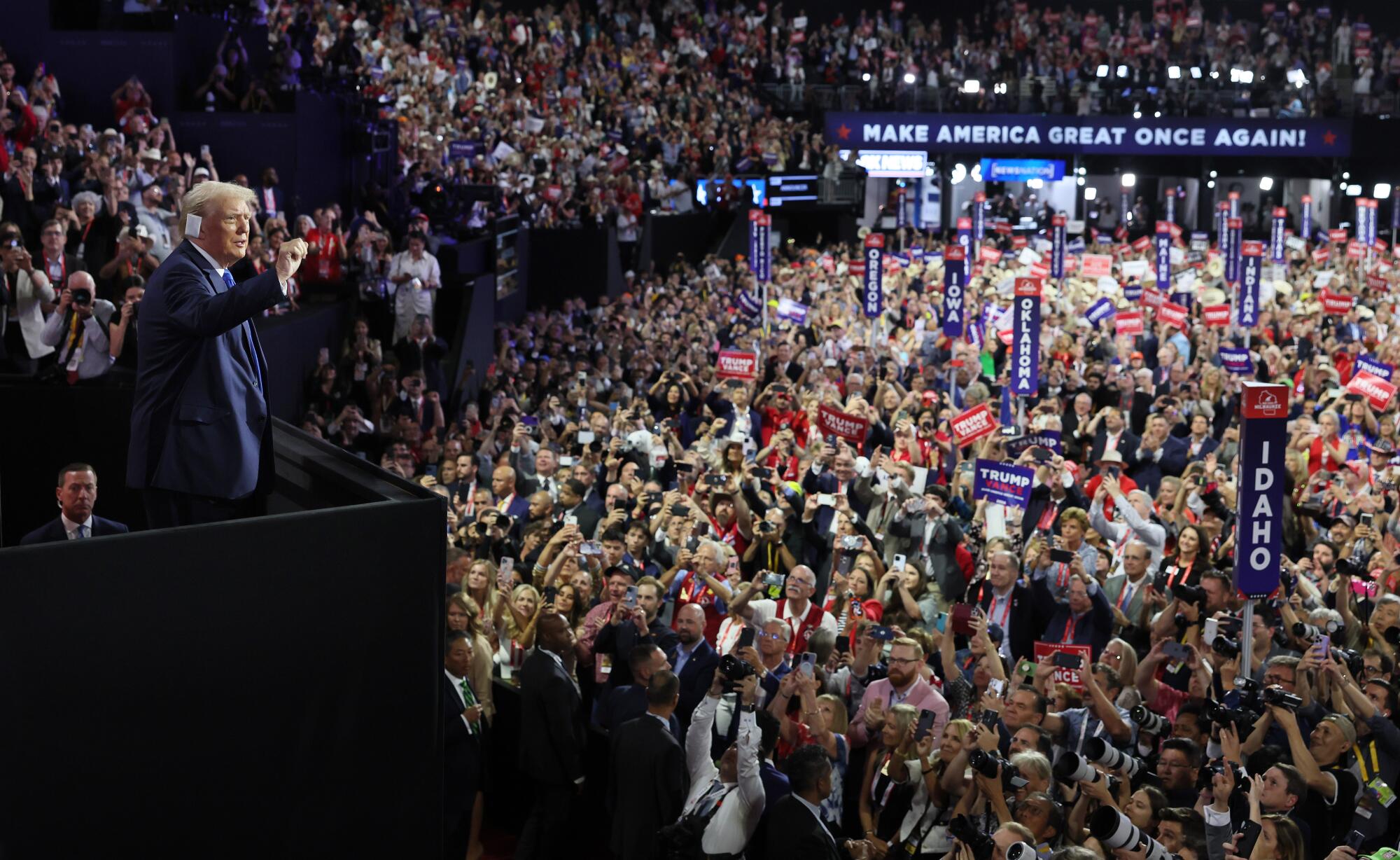 Republican presidential candidate former President Donald Trump acknowledges the delegates during the RNC. 