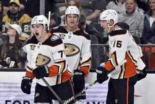 Anaheim Ducks right wing Frank Vatrano (77) celebrates a goal against the Vegas Golden.