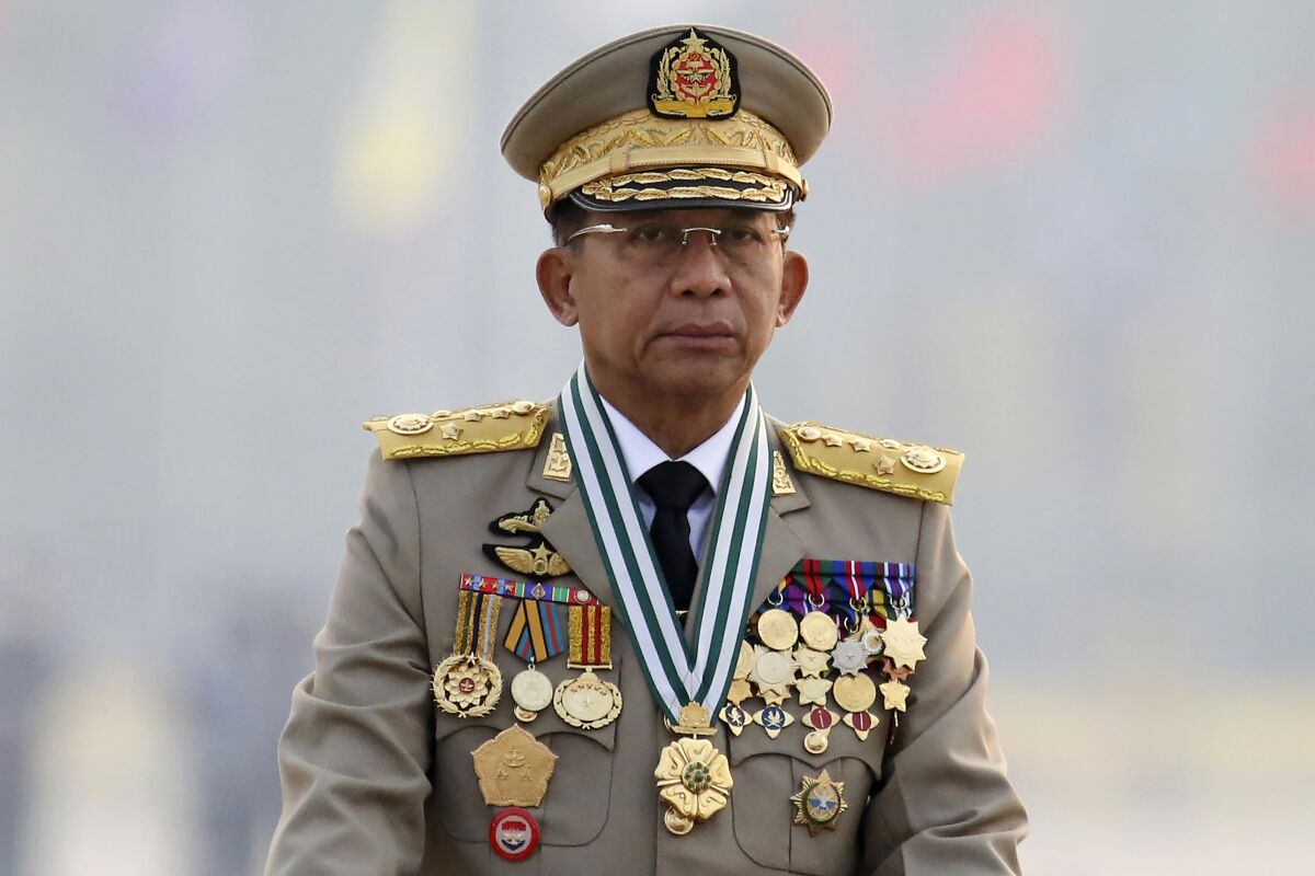 FILE - In this March 27, 2021, file photo, Myanmar's Commander-in-Chief Senior Gen. Min Aung Hlaing presides an army parade on Armed Forces Day in Naypyitaw, Myanmar. Southeast Asian foreign ministers have agreed to downgrade Myanmar's participation in its Oct. 26-28, 2021 summit in their sharpest rebuke yet of its leaders following a Feb. 1 military takeover. (AP Photo, File)