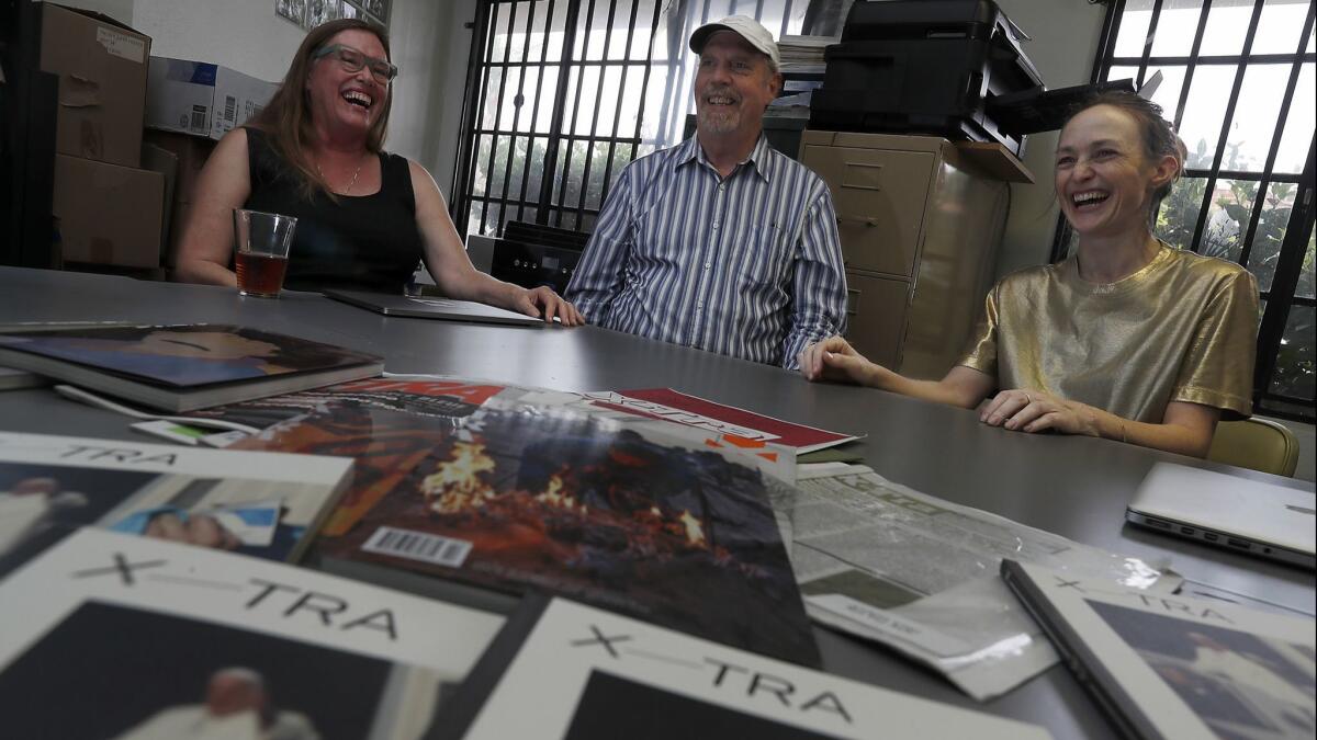Ellen Birrell, left, and Stephen Berens, founders of X-TRA, with executive director Shana Lutker.