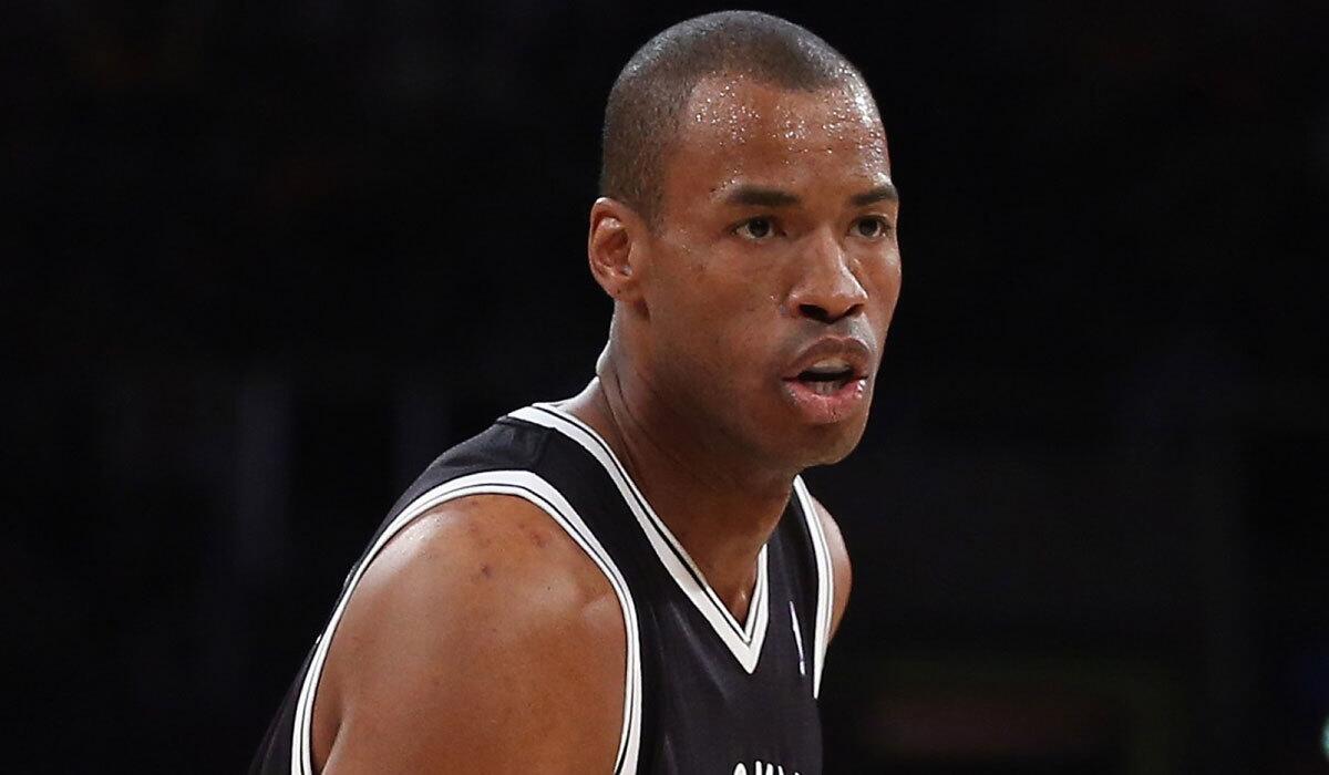 Jason Collins, shown with the Brooklyn Nets in February, announced his retirement from the NBA on Wednesday.