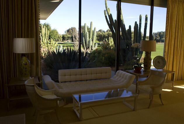 The sitting area in the master suite overlooks the desert landscape.