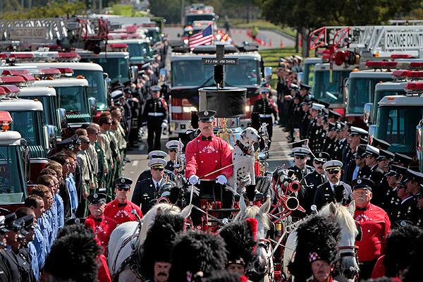 Funeral procession for Orange County Fire Authority firefighter Jimmy Owen, who died during a training exercise last week, at Mariners Church in Irvine.