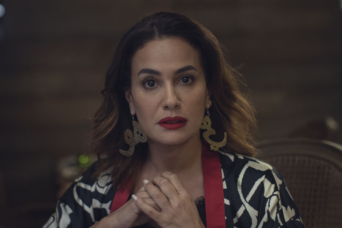 A woman looking at the camera