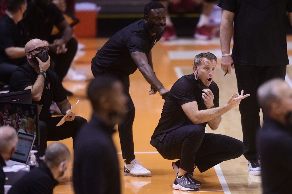 Alabama head coach Nate Oats gestures during a game at Thompson-Boling Arena in Knoxville, Tenn. on Saturday, Jan 2, 2021. (Caitie McMekin/Knoxville News Sentinel via AP, Pool)