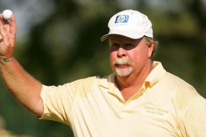 KETTERING, OH - JULY 28: Craig Stadler waves to the gallery on the 18th green after shooting 7-under par 64 during the first round of the U.S. Senior Open at the NCR Country Club on July 28, 2005 in Kettering, Ohio. (Photo by Scott Halleran/Getty Images) *** Local Caption *** Craig Stadler ORG XMIT: 53291263