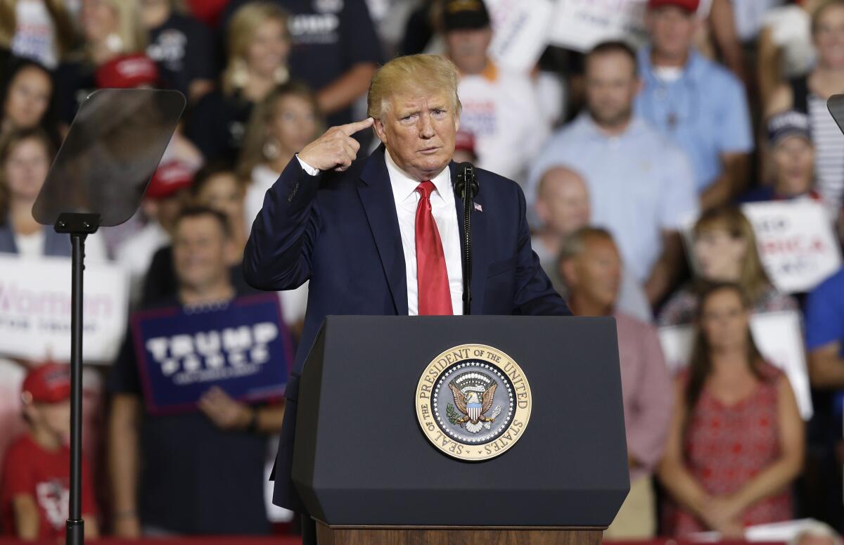 President Donald Trump gestures during a rally in Greenville, N.C. on July 17.