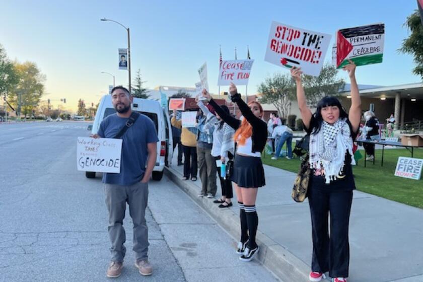 Activists rally outside El Monte City Hall on Tuesday, April 2 before the El Monte city Council meeting. The council unanimously passed a resolution asking for a permanent cease-fire in Gaza, becoming the seventh Latino majority city in Southern California to do so.