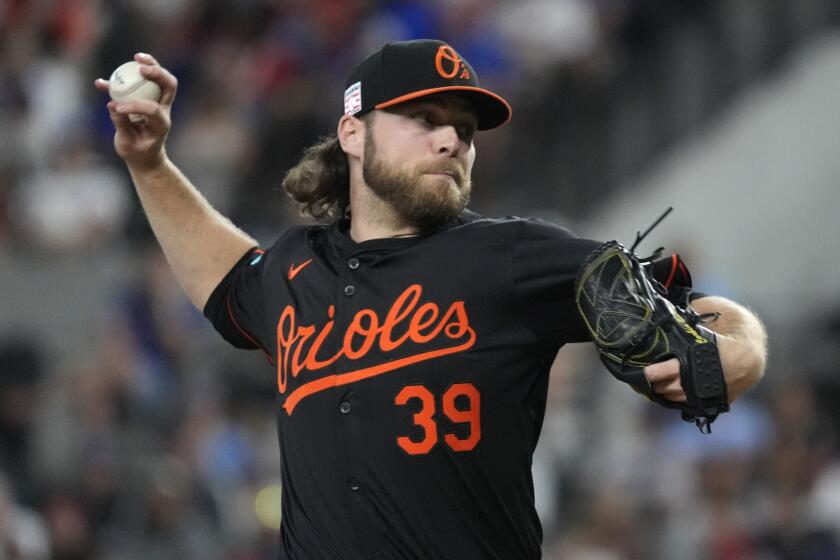 Baltimore Orioles starting pitcher Corbin Burnes throws during the first inning.