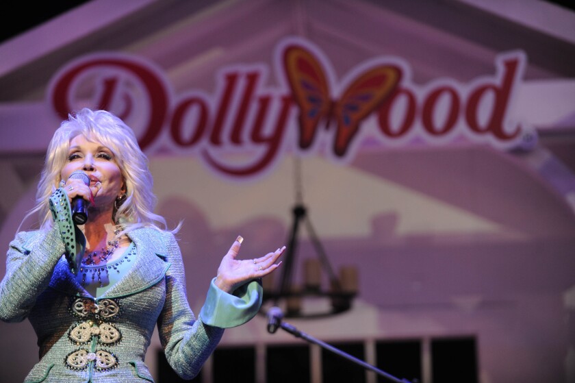 Dolly Parton, proprieter of Dollywood, had a surprise for Queen Latifah.