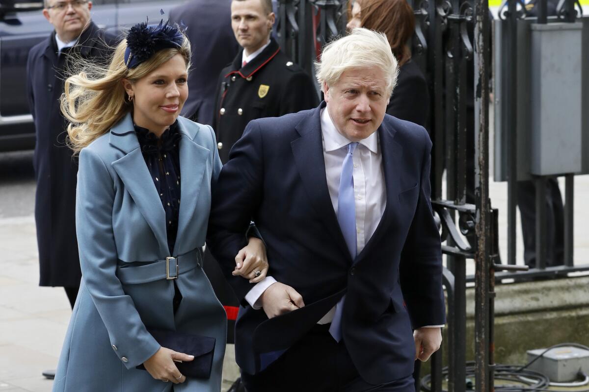 British Prime Minister Boris Johnson and his partner, Carrie Symonds