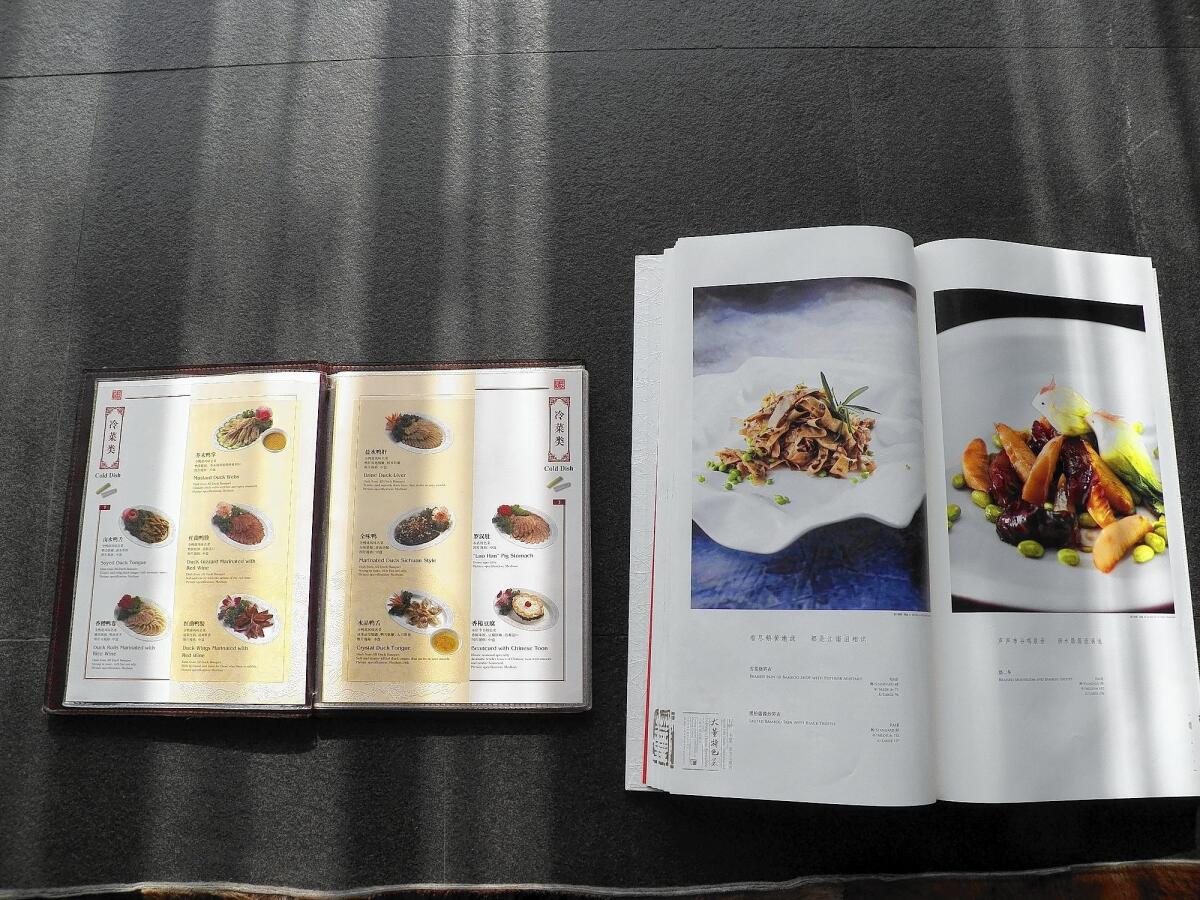 The menu at China's Da Dong restaurant chain has grown from its 1990s version to one that weighs 5 pounds, 4 ounces, and measures 20 inches tall, 15 inches wide and more than an inch thick. The 140-page tome lists about 200 dishes.