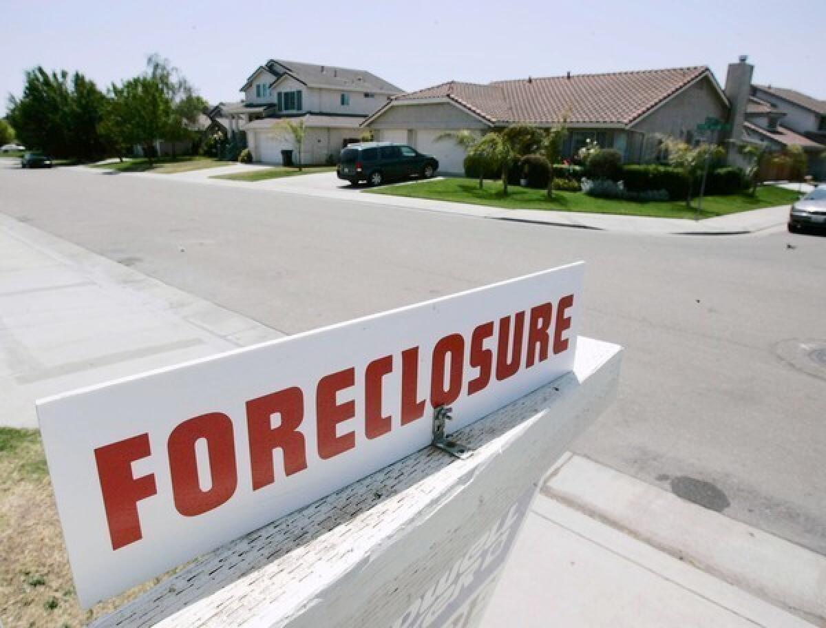 Foreclosures are partly why many cities in California such as Stockton, pictured above, are facing serious financial difficulties.