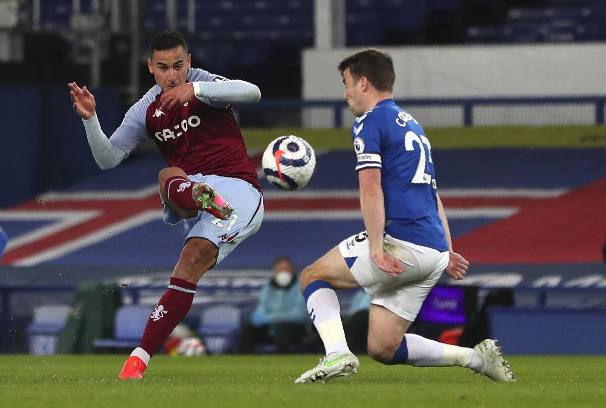 Aston Villa's Anwar El Ghazi scores his side's second goal during the English Premier League soccer match between Everton and Aston Villa at Goodison Park in Liverpool, England, Saturday, May 1, 2021. (Peter Byrne/Pool via AP)