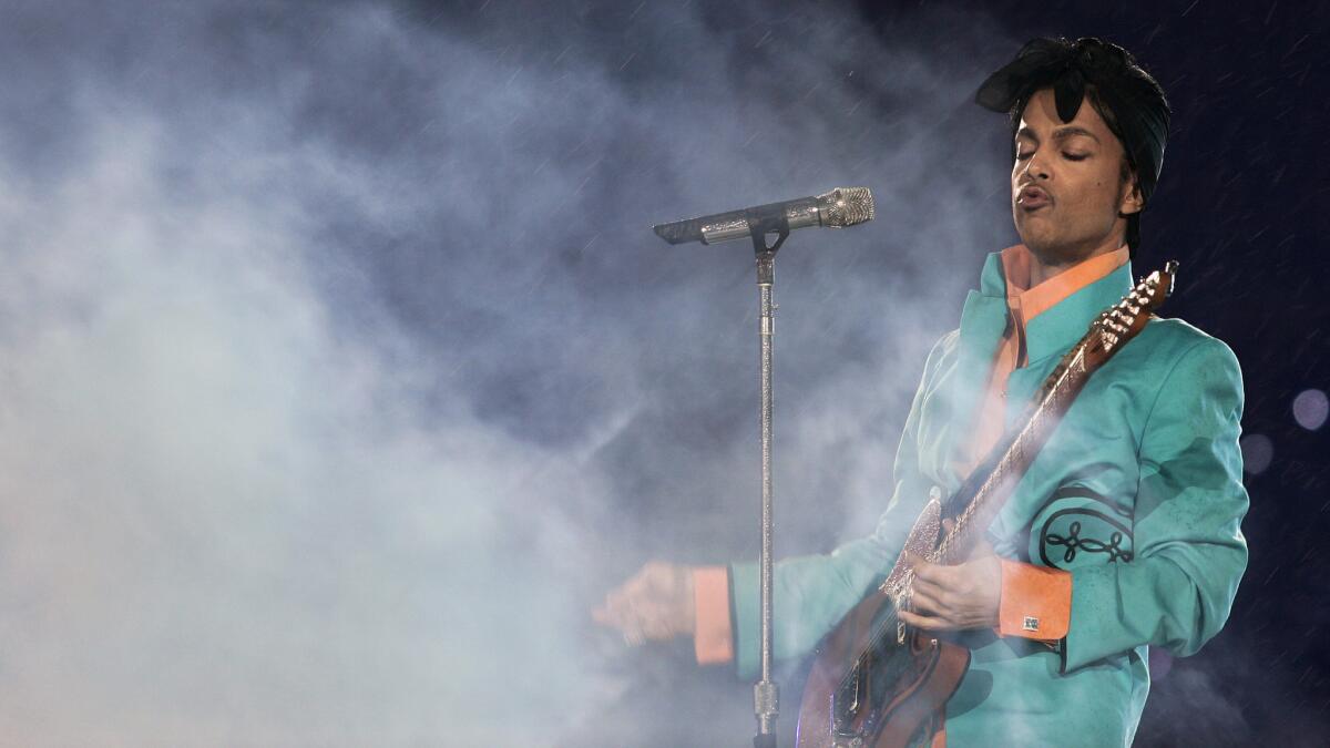 Prince performs in 2007 during the Super Bowl halftime show.