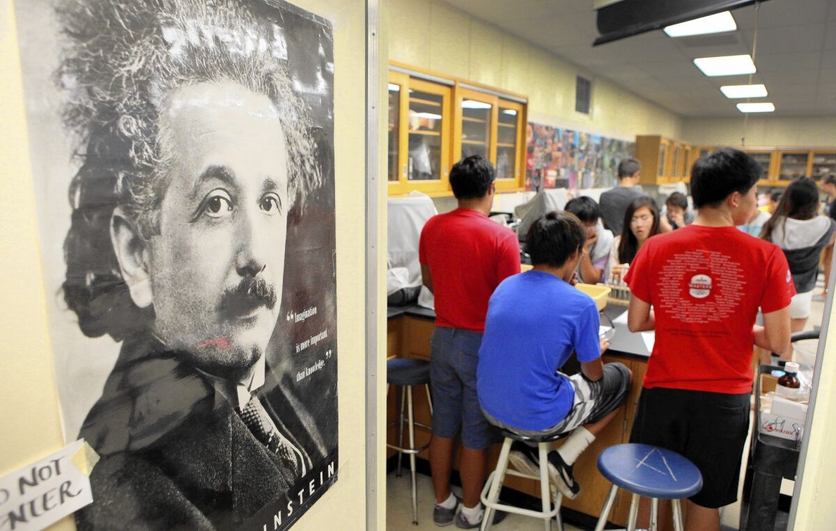 A poster of Albert Einstein hangs on a door at Peninsula High School, where Julie Maemoto teaches a summer biology class offered by the Peninsula Education Foundation.