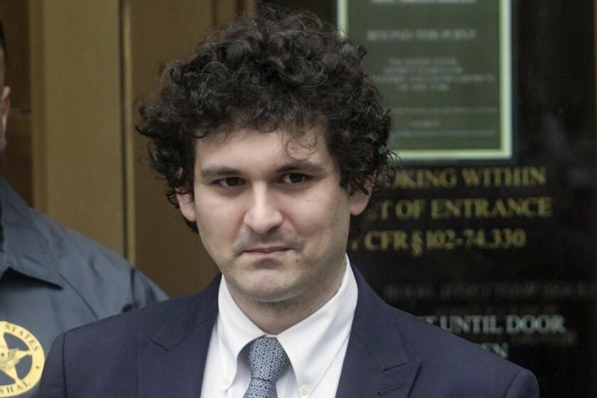 FILE - FTX founder Sam Bankman-Fried leaves Manhattan federal court, Thursday June 15, 2023, in New York. Bankman-Fried is returning to New York City for a court hearing Friday, Aug. 11, 2023, that could decide whether the fallen cryptocurrency wiz has to go to jail while he awaits trial. (AP Photo/Bebeto Matthews, File)
