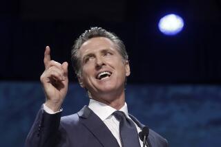 FILE - In this June 1, 2019, file photo, Gov. Gavin Newsom speaks during the 2019 California Democratic Party State Organizing Convention in San Francisco. Gov. Newsom is wrapping up a first year highlighted by the bankruptcy of the country's largest utility, an escalating homelessness crisis and an intensifying feud with the Trump administration, along with record-low unemployment and a booming state economy producing a multi-billion-dollar surplus. (AP Photo/Jeff Chiu, File)