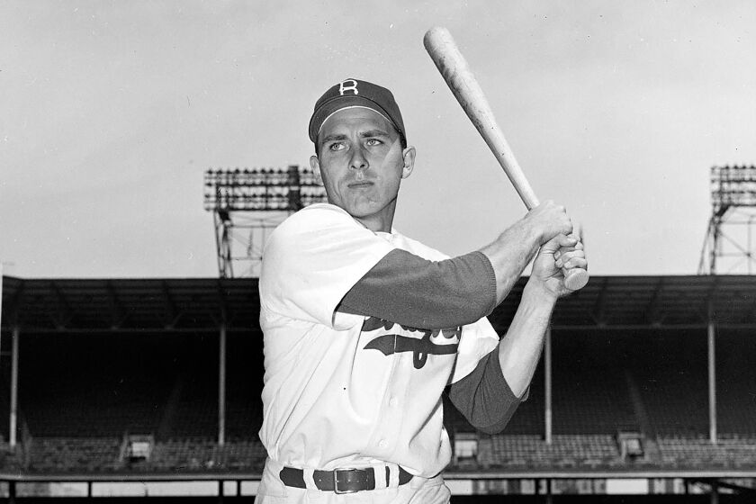 FILE - Brooklyn Dodgers infielder Gil Hodges is shown in posed action in New York, May 10, 1951. Hodges will be posthumously inducted into the Baseball Hall of Fame on Sunday, July 24, 2022. (AP Photo/John Rooney)