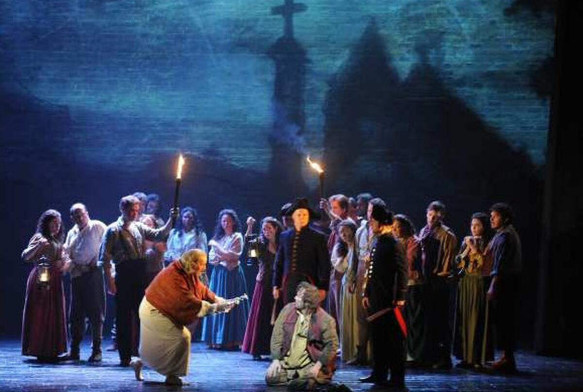 A scene from the 25th anniversary touring production of "Les Miserables," at the Ahmanson Theatre in 2011.