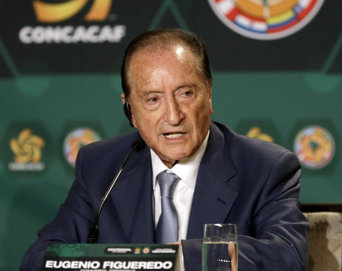 May 1, 2014 photo of Eugenio Figueredo, president of CONMEBOL, the South America soccer confederation, speaks during a news conference in Bal Harbour, Fla.. Figueredo is among seven soccer officials that were arrested and detained by Swiss police on Wednesday, May 27, 2015, at the request of U.S. authorities after a raid at Baur au Lac Hotel in Zurich.