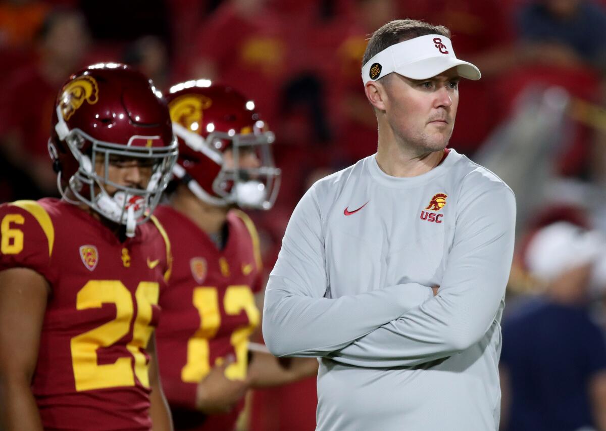 USC coach Lincoln Riley watches the Trojans warm up before a win over Arizona State on Oct. 1.