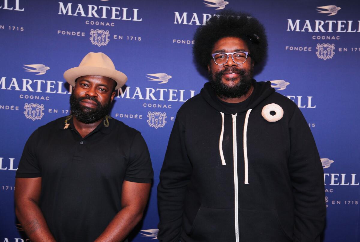 Questlove, right, and Black Thought of the Roots at an event in Detroit. The hip-hop mainstays have pulled out of a David Bowie tribute show.