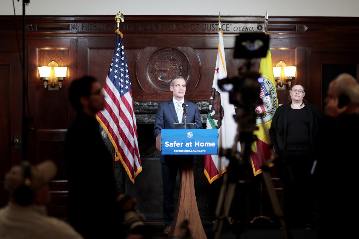 Mayor Eric Garcetti delivers his evening coronavirus briefing from Los Angeles City Hall on March 26.