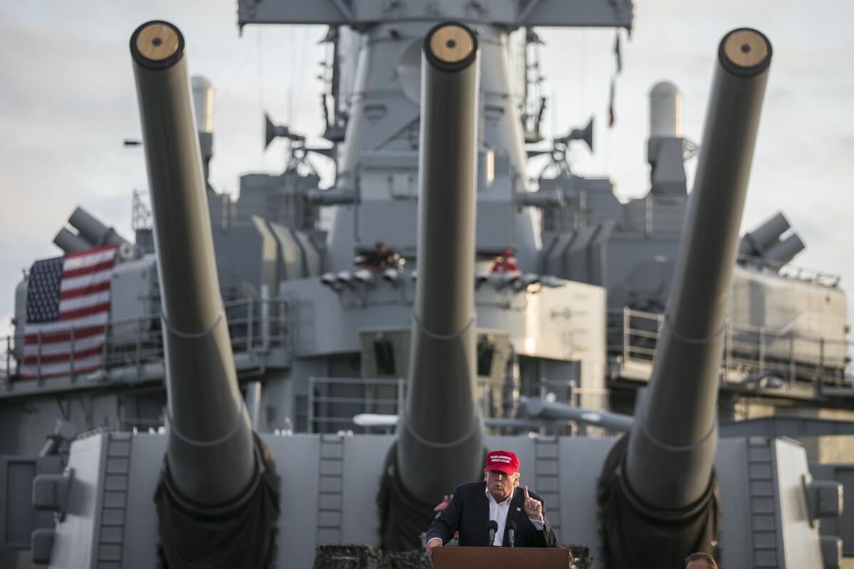 Republican candidate Donald Trump speaks from the deck of the battleship Iowa last year.
