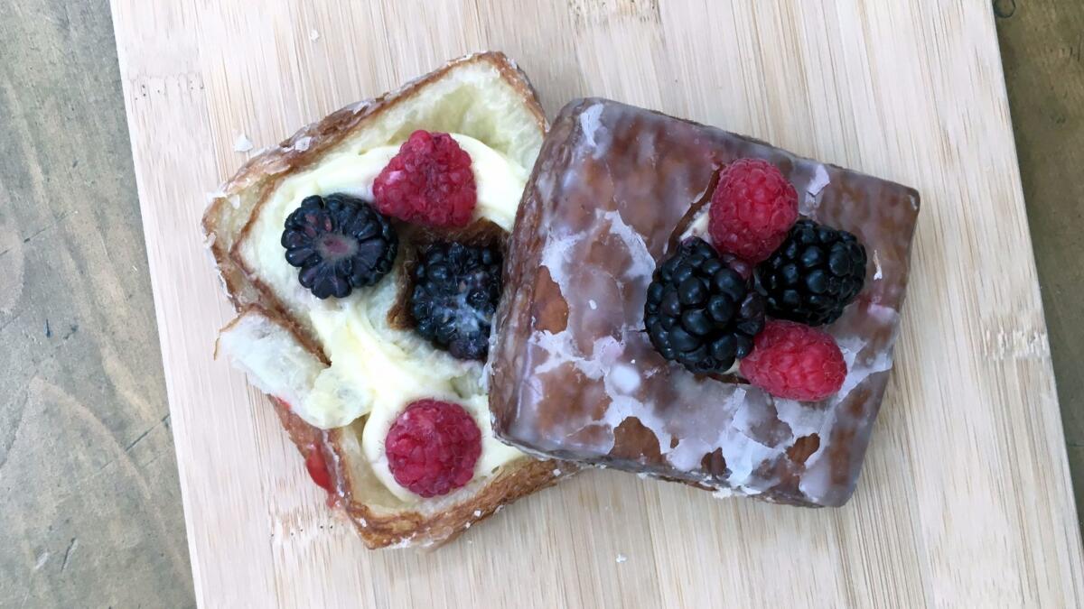 Custard and berries croissant doughnut from Colorado Donuts. (Jenn Harris / Los Angeles Times)