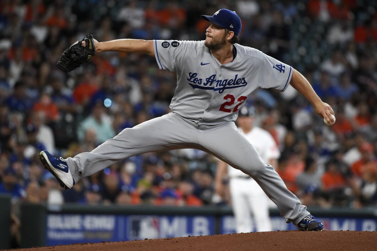 Dodgers starting pitcher Clayton Kershaw delivers during the first inning against the Houston Astros.