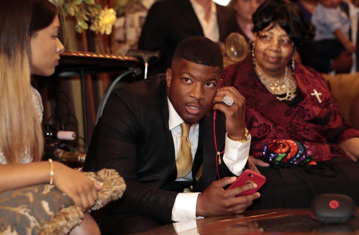 Jameis Winston takes the call Thursday night in Bessemer, Ala., from the Tampa Bay Buccaneers, who selected the former Florida State quarterback with the No. 1 pick in the NFL draft.