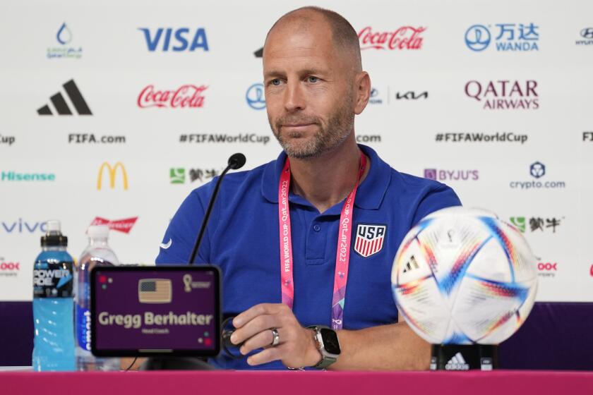 Head coach Gregg Berhalter of the United States attends a press conference on the eve of a round of 16 World Cup soccer match