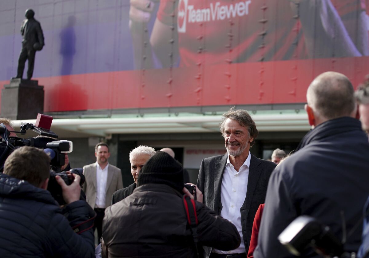 Businessman Jim Ratcliffe leaves Old Trafford, in Manchester, England, Friday March 17, 2023. Bidders are getting a closer look at Manchester United as the potential sale of one of the biggest soccer clubs in the world gathers pace. (Peter Byrne/PA via AP)