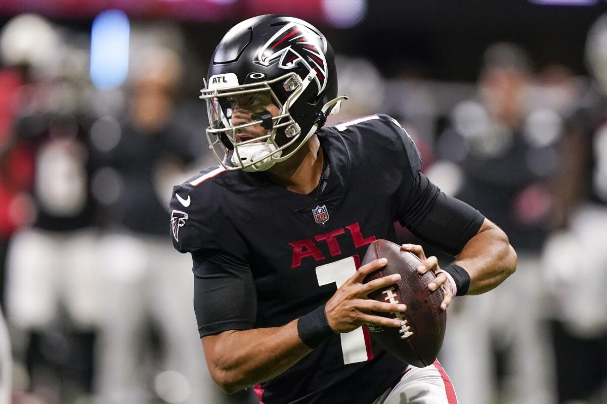 Atlanta Falcons quarterback Marcus Mariota runs out of the pock during a loss to the New Orleans Saints on Sept. 11.