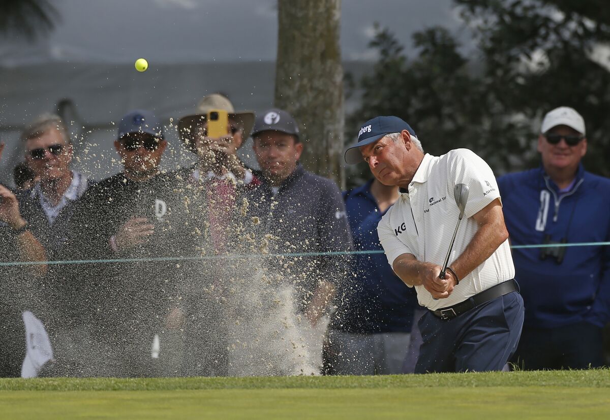 Fred Couples hits from a green-side bunker on the 15th hole during the Hoag Classic on Saturday.
