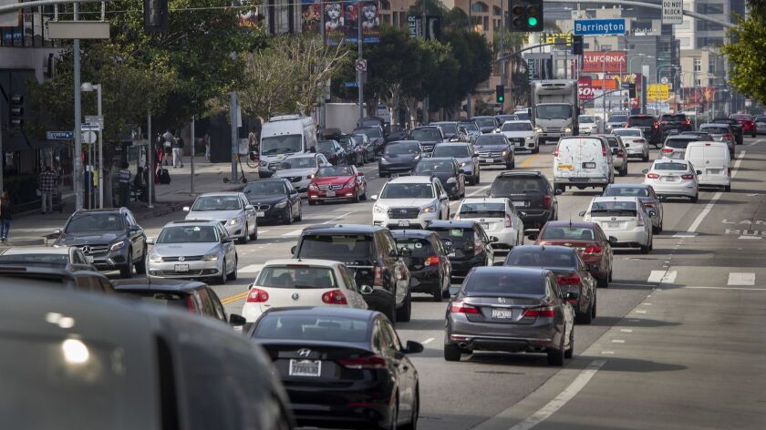 Traffic moves slowly during morning rush hour along Wilshire Boulevard on Los Angeles' Westside.