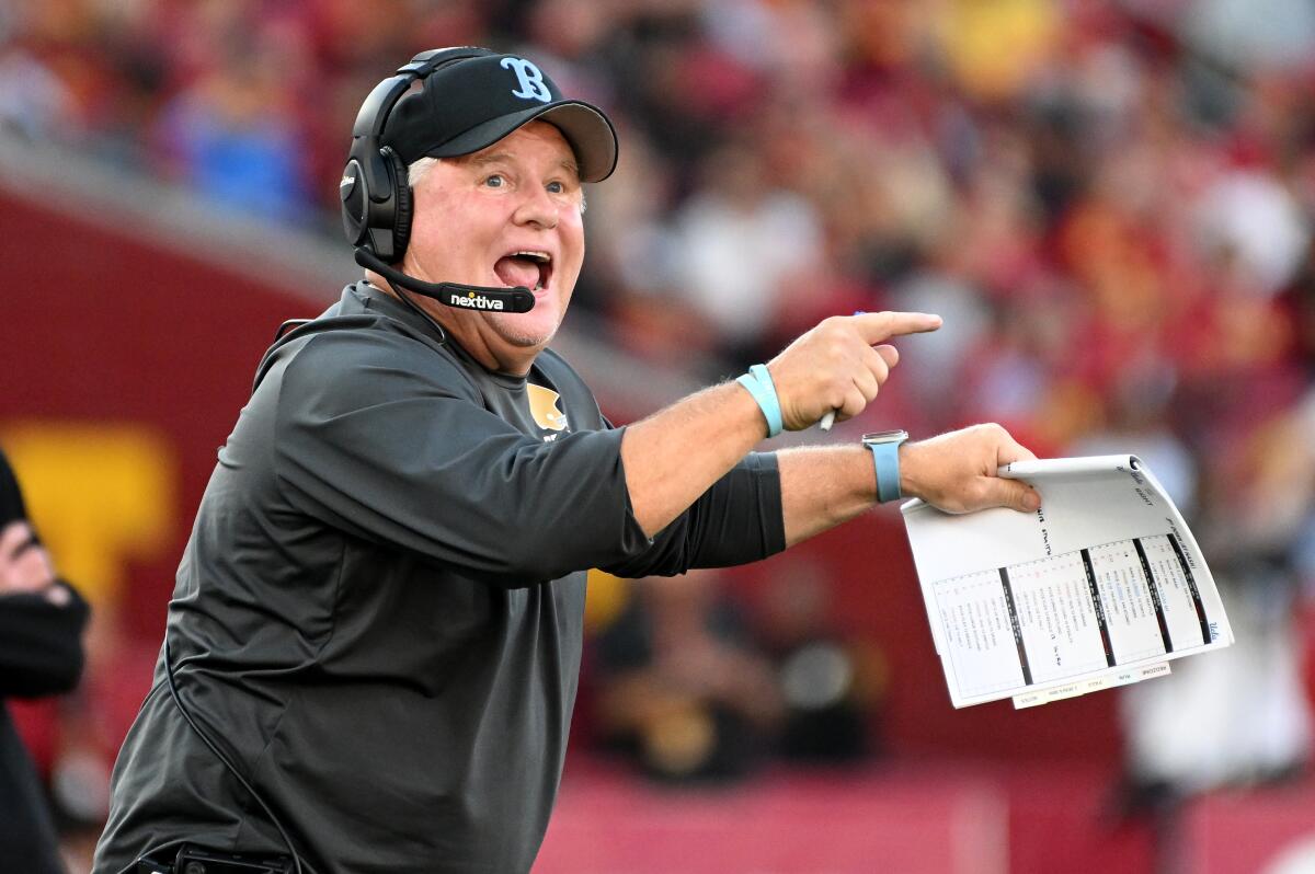 UCLA coach Chip Kelly gestures during the Bruins' win over USC at the Coliseum.