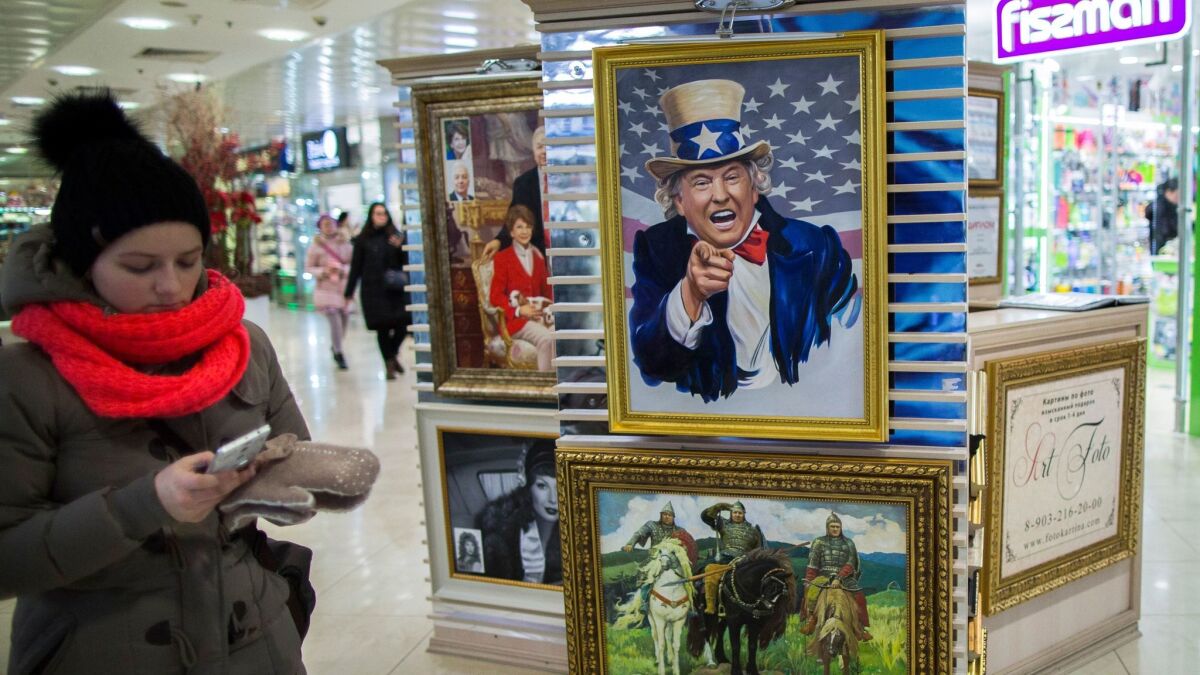 A caricature of President Trump is on sale at a shopping mall in Moscow on Feb. 15.