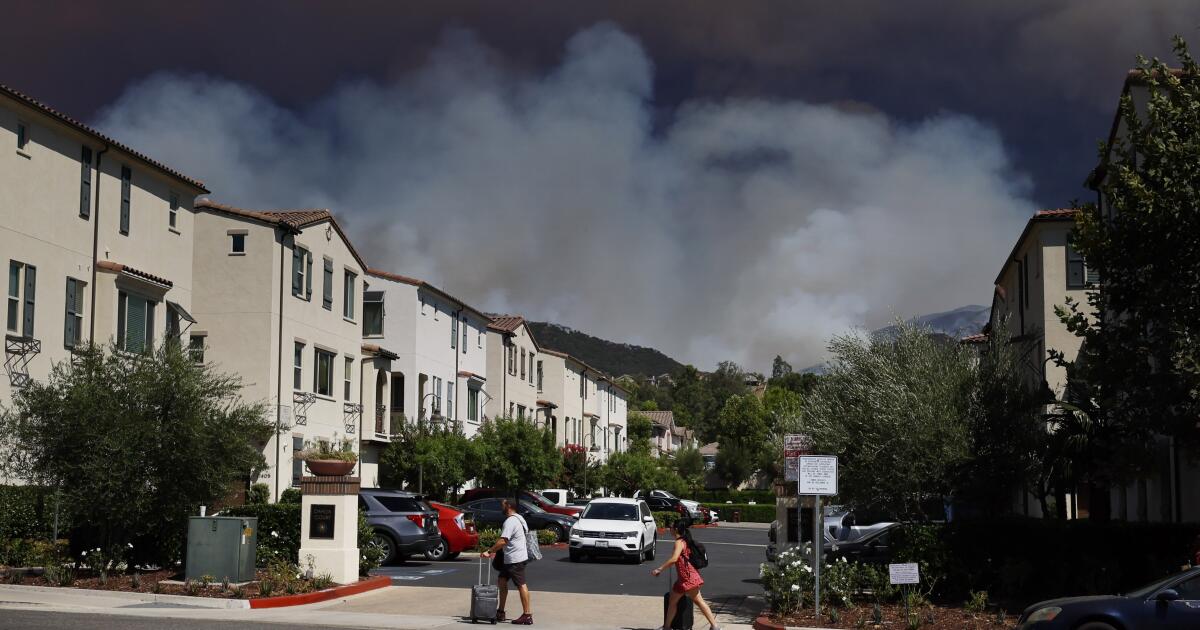 Sleepless nights, flames and heat for O.C. residents threatened by Airport Fire