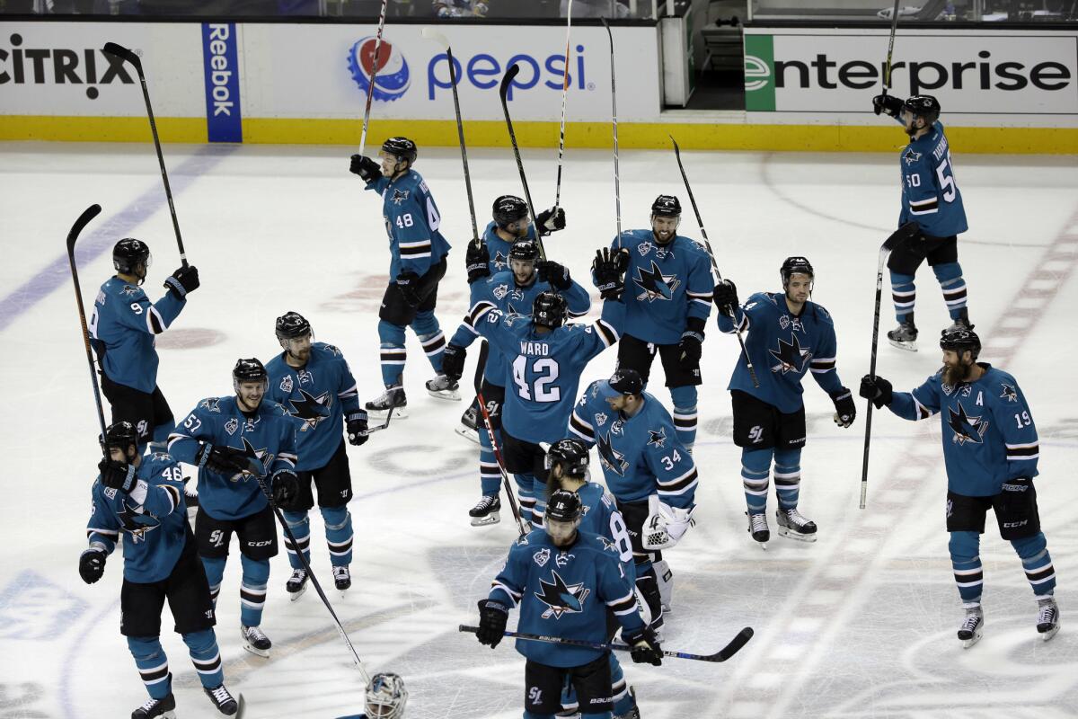 The Sharks celebrate after a 3-0 win over the St. Louis Blues during Game 3 Western Conference finals.