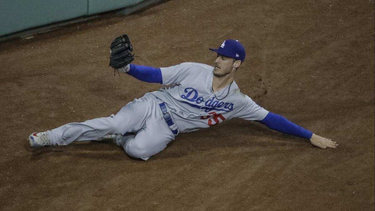 Cody Bellinger makes a sliding catch at Fenway Park during Game 2 of the World Series against the Boston Red Sox in October.