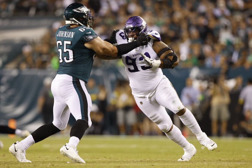 FILE -Minnesota Vikings defensive lineman Jonathan Bullard (93) rushes against Lane Johnson (65) during an NFL football game against the Philadelphia Eagles on Monday, Sept. 19, 2022, in Philadelphia. The Minnesota Vikings agreed to terms on a new contract on Tuesday, March 21, 2023 with defensive lineman Jonathan Bullard, who played in 12 games with seven starts last season.(AP Photo/Matt Patterson, File)