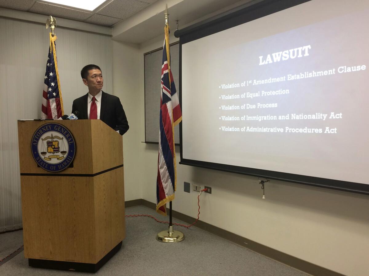 Hawaii Atty. Gen. Doug Chin at a news conference about Hawaii's legal challenge to President Trump's travel ban.